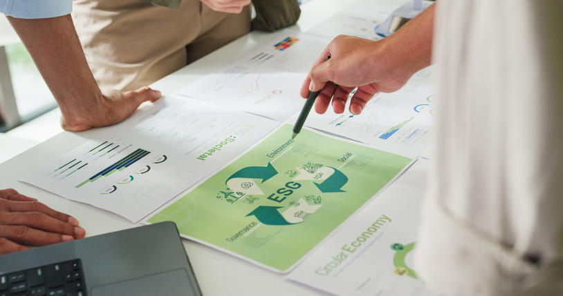 Closeup group Asia businesspeople talk ESG strategies risk management workshop, SDGs report, global warming, green finance investment eco friendly and net zero waste in boardroom training building.