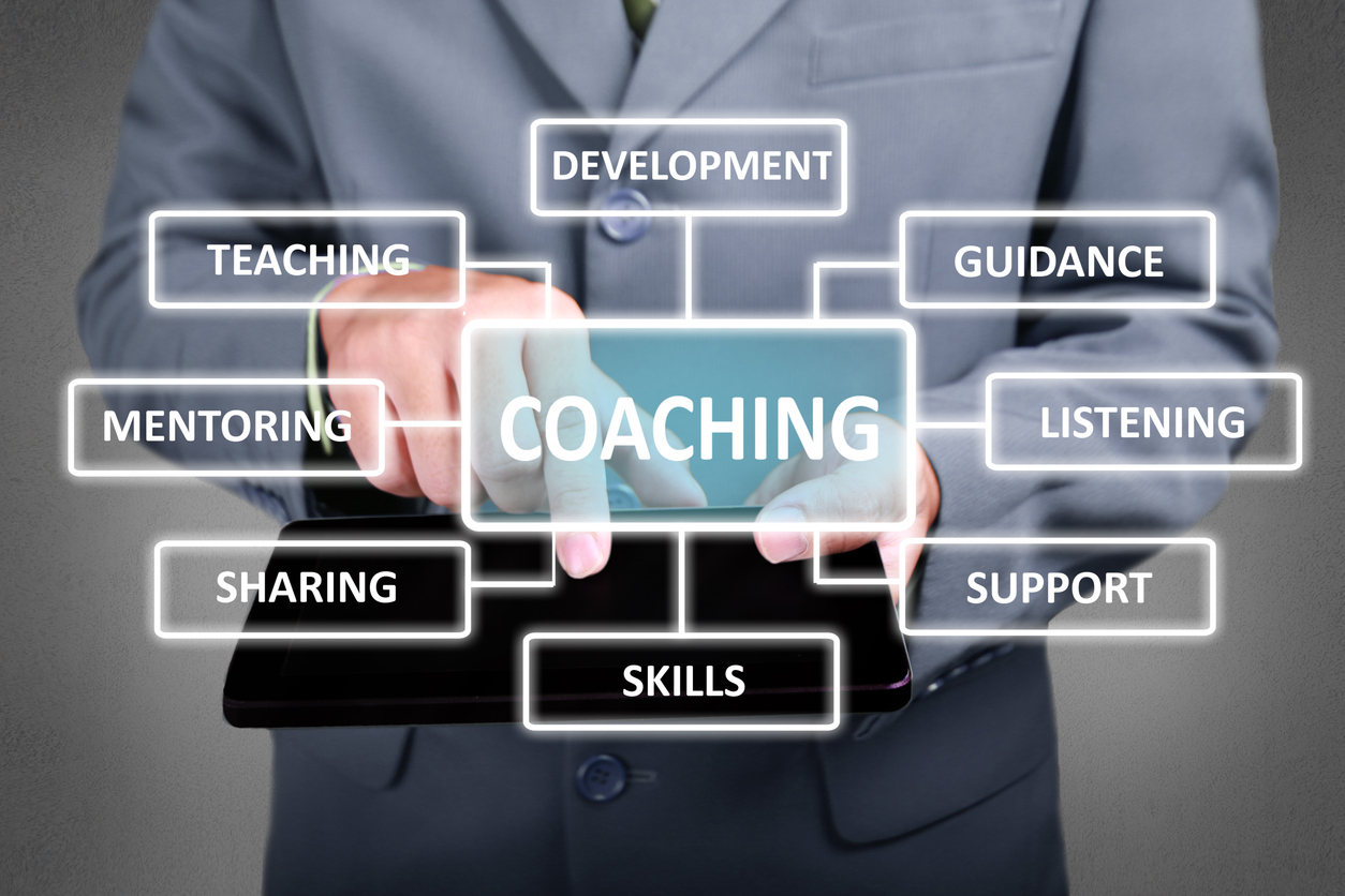 Business Concept. Businessman click coaching button on his tablet. Coaching strategy scheme diagram. Text typography design